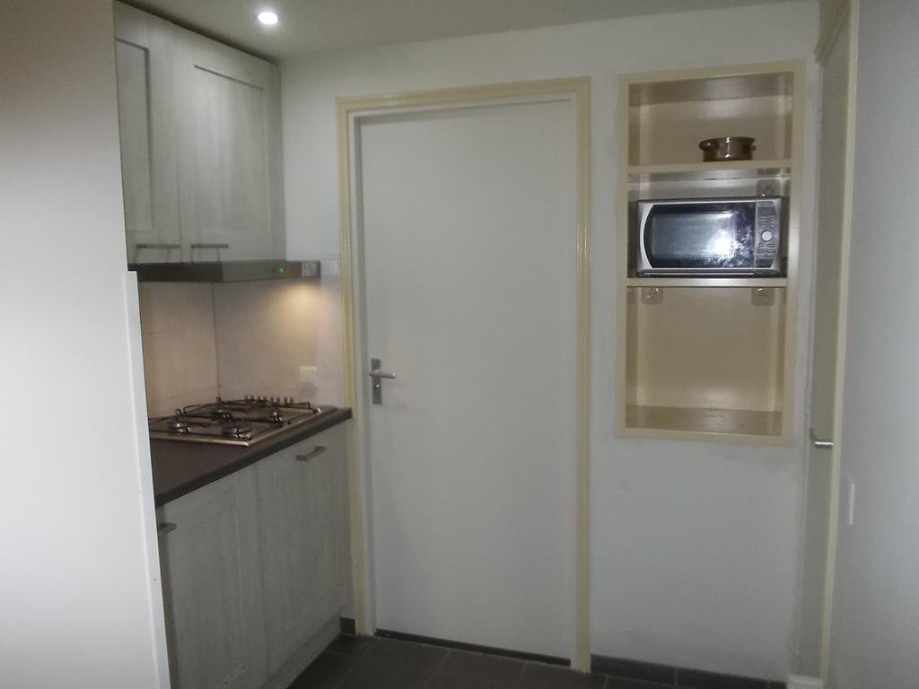 Apartment + Studios Insulinde Tilburg Szoba fotó